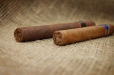 Two Cuban Cigars On Hessian Canvas Stock Image Two Cuban Cigars On Hessian Canvas Stock Image