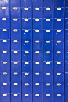 Wall Of Blue Post Office Boxes Royalty Free Stock Image
