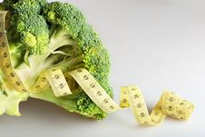 Green Broccoli With Tape Measure Stock Photo Green Broccoli With Tape Measure Stock Photo