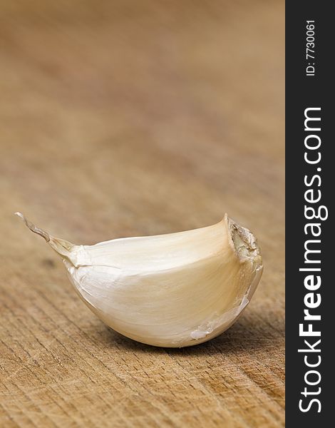 Garlic on a wooden cutting table