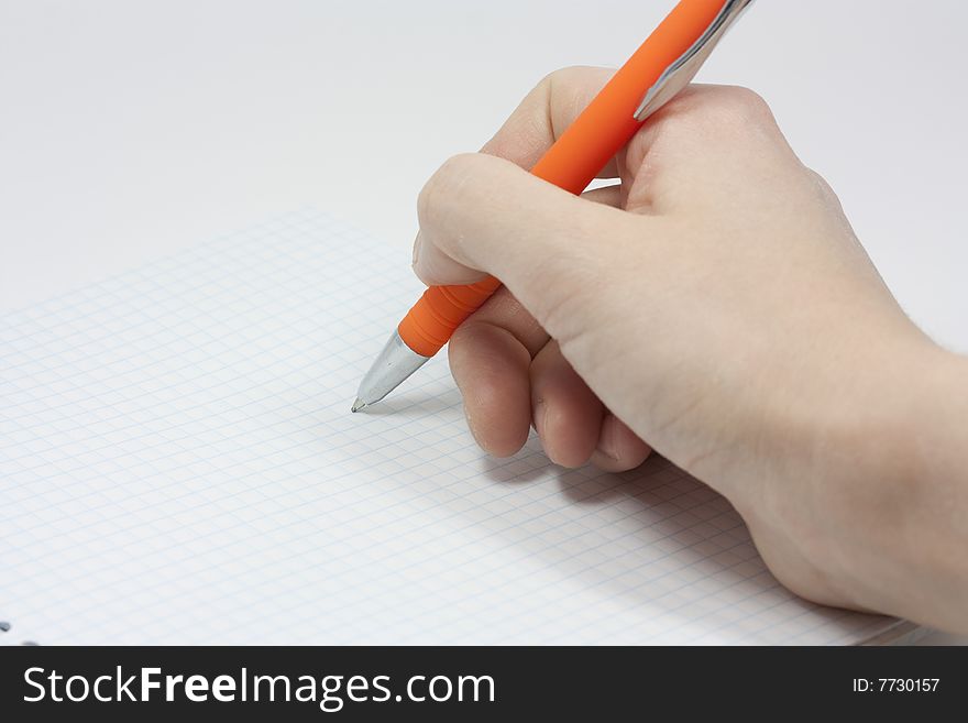 Closeup shot of pen writing on blank area