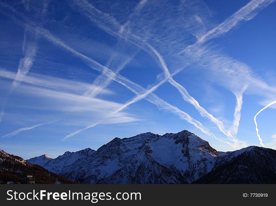 Tracks of airships on the clean deep blue sky. Tracks of airships on the clean deep blue sky