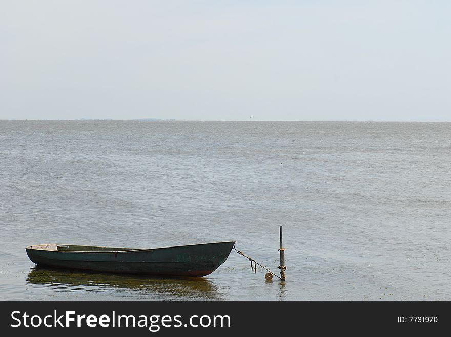 Adhered boat in sea landscape