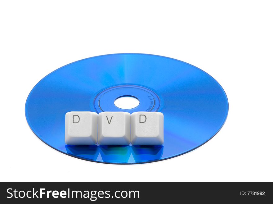 DVD disk isolated and DVD letters by keyboard keys. DVD disk isolated and DVD letters by keyboard keys