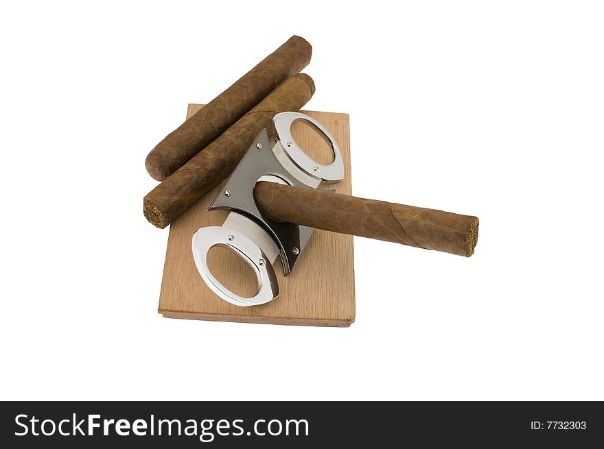 Cigars and guillotine isolated on white