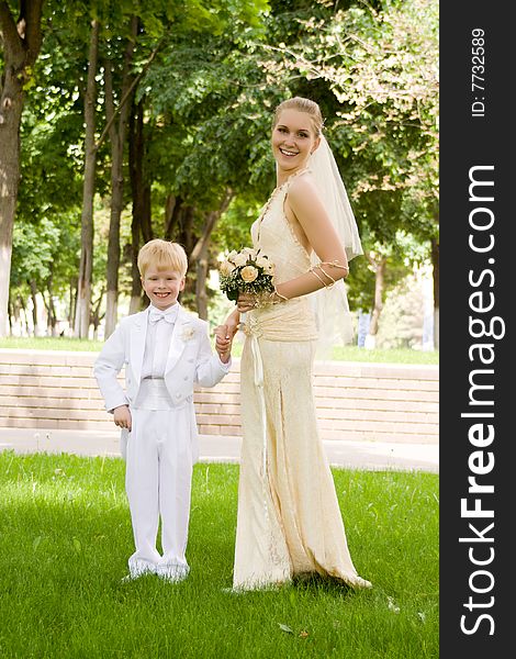 The bride near to the younger brother or the nephew. The bride near to the younger brother or the nephew