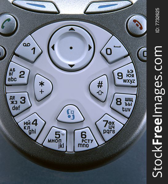 Round mobile phone keypad with a joystick