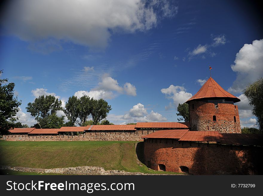 Red architectural ancient monument under blue sky