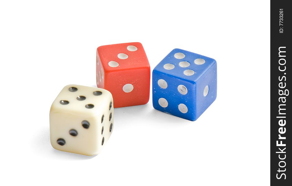 Multicolor dice close up isolated on white background (with clipping path)