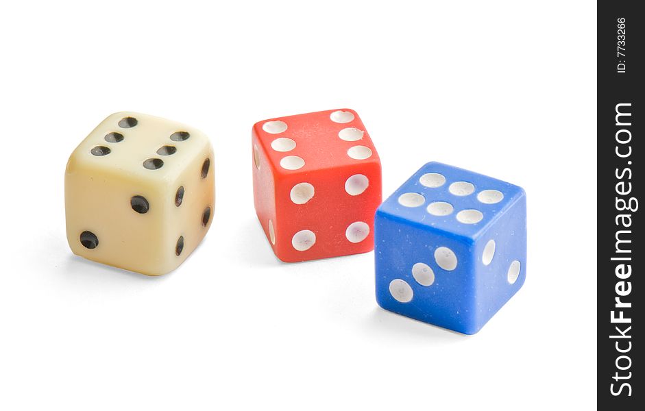 Multicolor dice close up isolated on white background (with clipping path)