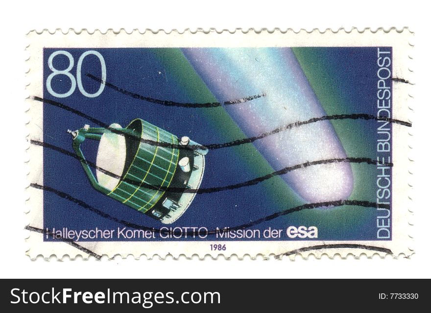 Old canceled german stamp with Giotto robotic spacecraft