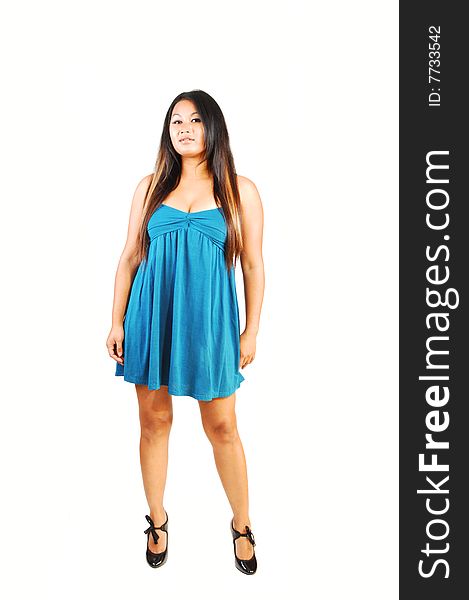 A young Asian long hair woman standing in an blue dress and high heels in 
the studio. A young Asian long hair woman standing in an blue dress and high heels in 
the studio.