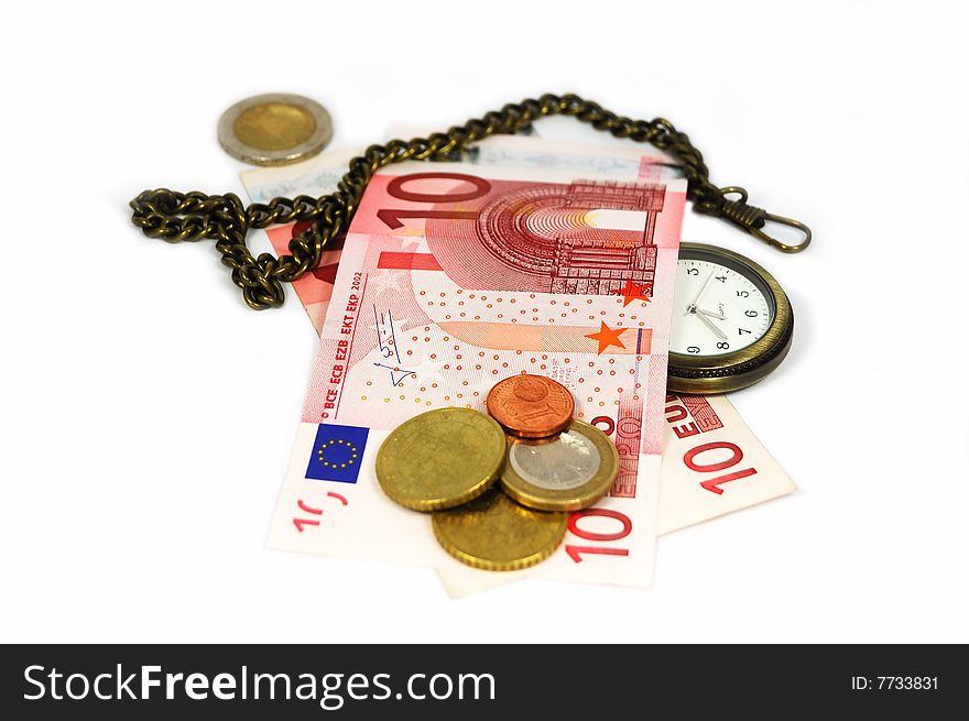 Pocket watch among coins and banknotes isolated on white. Time is money concept.