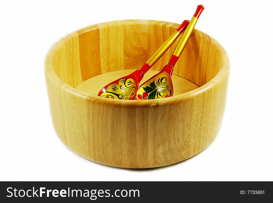 Russian wooden spoons on wooden bowl