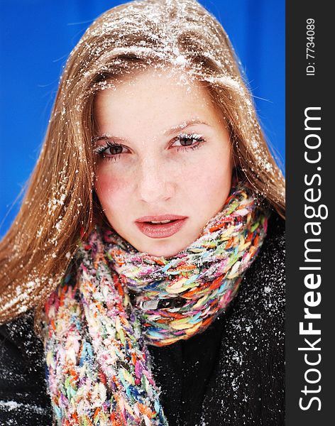 Beautiful young woman with snow on her hair. Beautiful young woman with snow on her hair