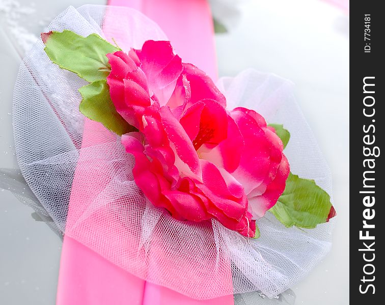 Wedding decoration on black limousine car.