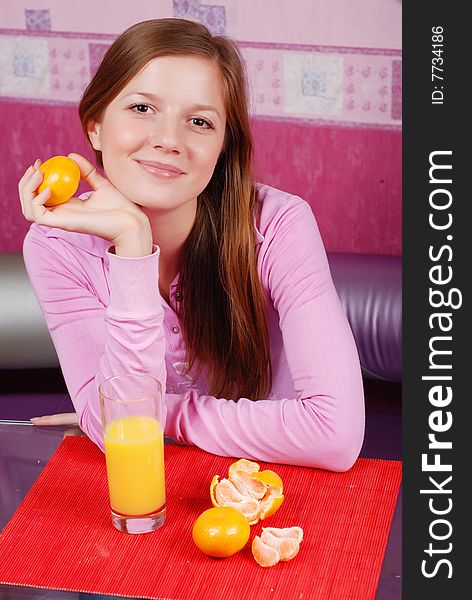Portrait of woman with glass of orange juice. Portrait of woman with glass of orange juice