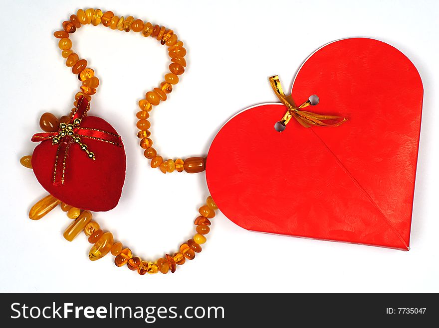 Valentine day gift amber necklace on white. Valentine day gift amber necklace on white