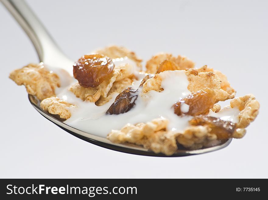 Bowl Of Cereal With Raisins And Milk