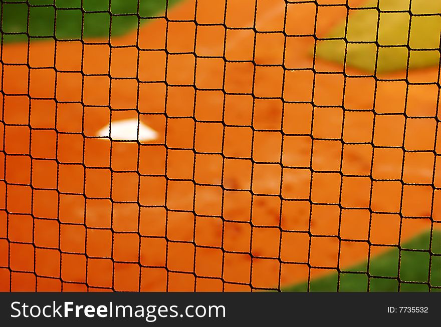 Looking through the net at ballfield