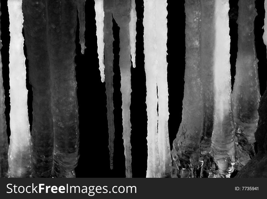 Black and white picture of icicles