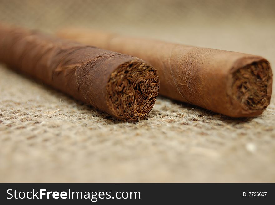 Two Cuban Cigars On Hessian Canvas