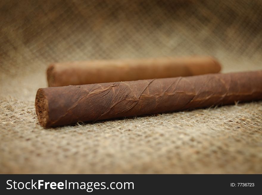 Two Cuban Cigars On Hessian Canvas