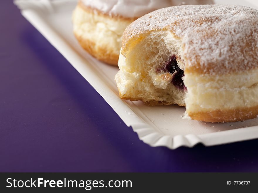 Donut, choux pastry filled with jam