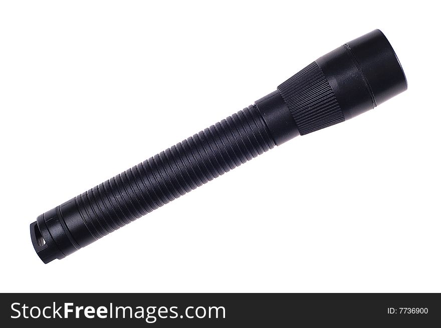 Small black flashlight isolated on the white background. Small black flashlight isolated on the white background.