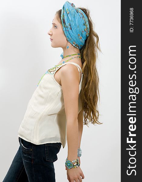 Fashion Girl Posing With Blue Scarf In Hair