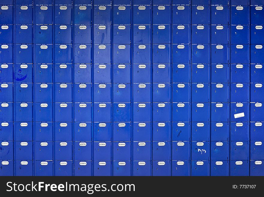 Long Wall Of Blue Post Office Boxes