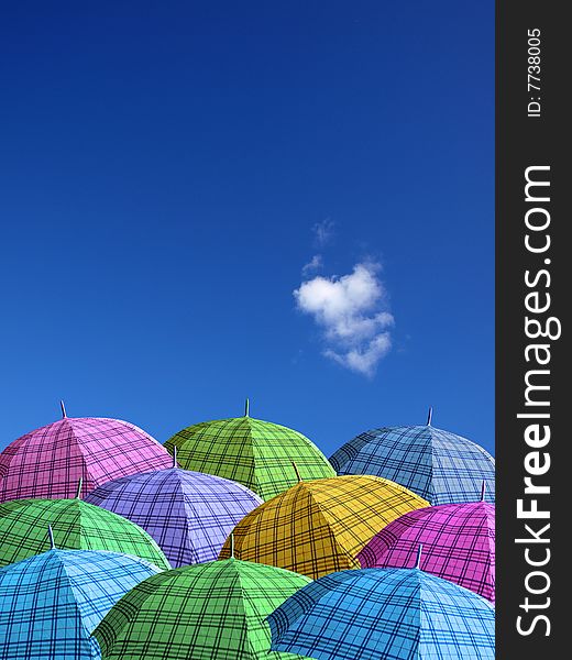 Colorful umbrellas under the clear sky. Colorful umbrellas under the clear sky