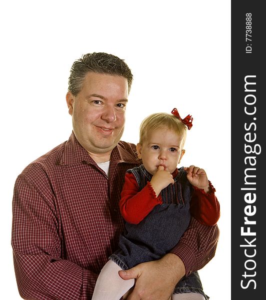 A proud father holding his young daughter on white background. A proud father holding his young daughter on white background