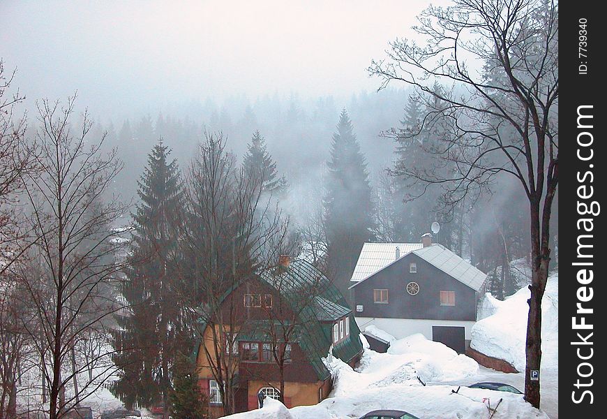 Spindleruv Mlyn: fog-covered mountain village in Czech Republic.