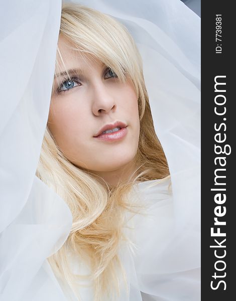 A beutiful blond girl in white looking for love. A beutiful blond girl in white looking for love