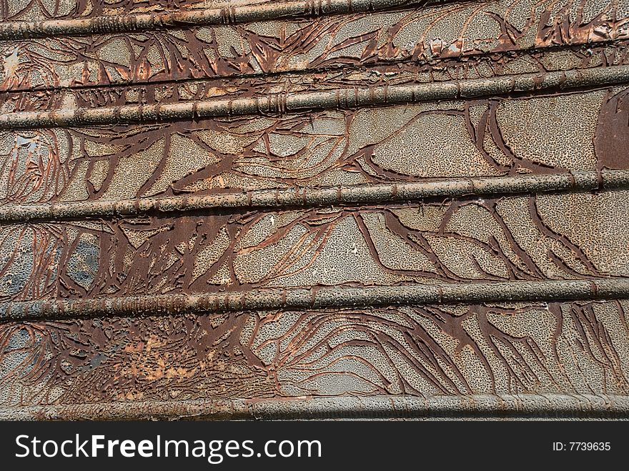 Rusty metal surface with cracks