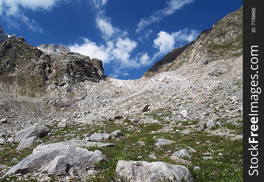 Pass in the mountains. Blue sky.