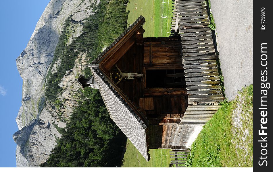 A small chapel im an alpine village. A small chapel im an alpine village.