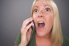 Stunned Blond Woman Using Cell Phone Stock Photos Stunned Blond Woman Using Cell Phone Stock Photos