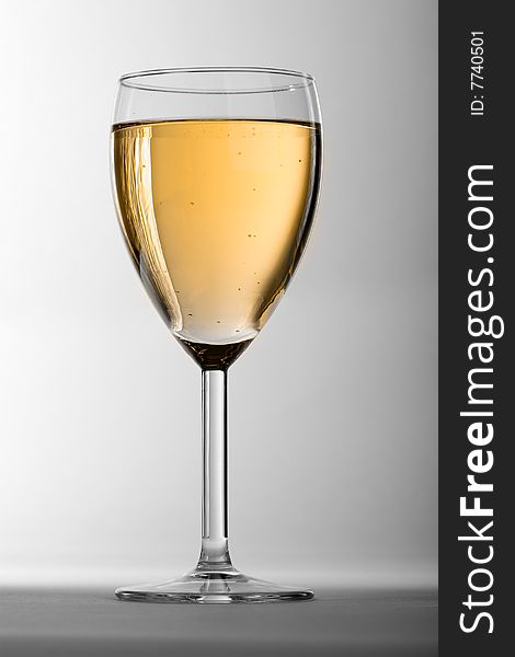 Glass with beautiful sparkling wine. Glass with beautiful sparkling wine