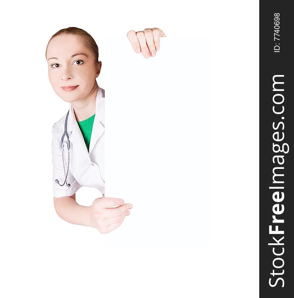 Female doctor with empty board; white background. Female doctor with empty board; white background