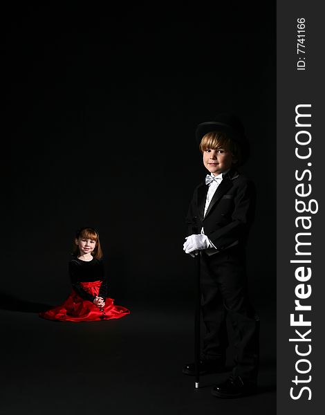 Cute children in formal clothing with boy in foreground. Cute children in formal clothing with boy in foreground