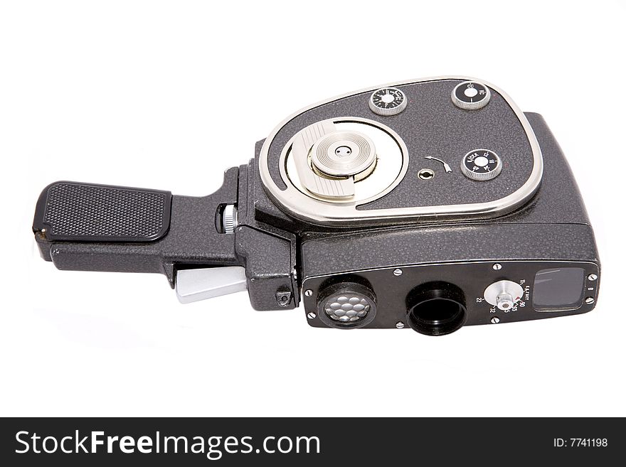 Old movie camera isolated on white