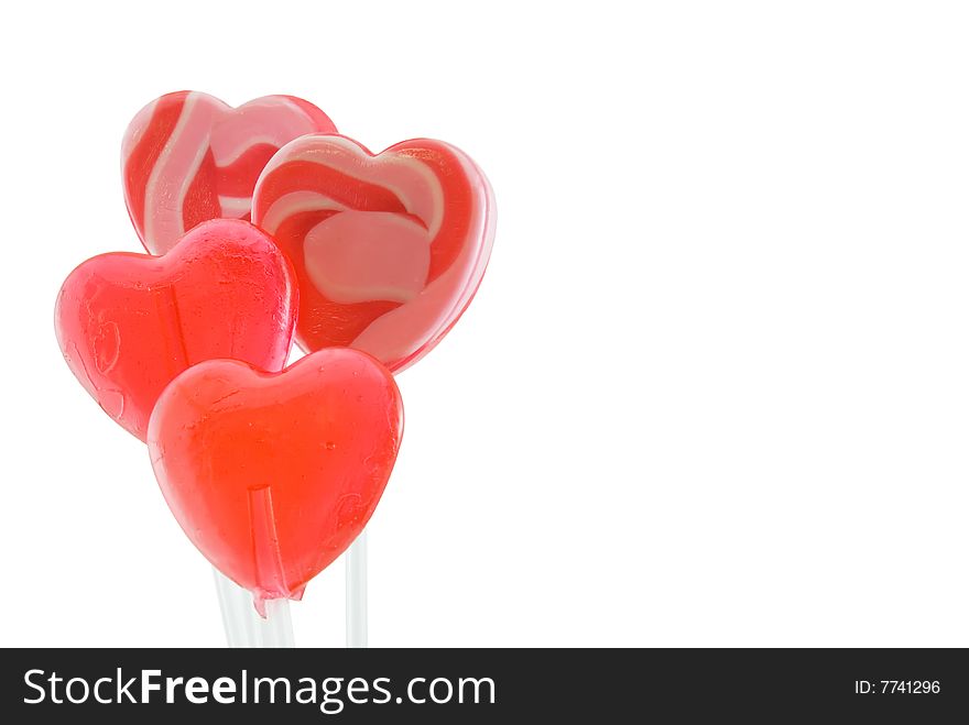 Heart shaped suckers isolated on white with blank space. Heart shaped suckers isolated on white with blank space