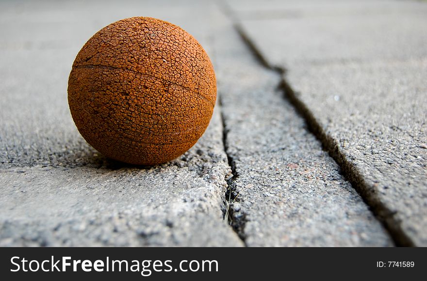 Orange ball, a dog toy