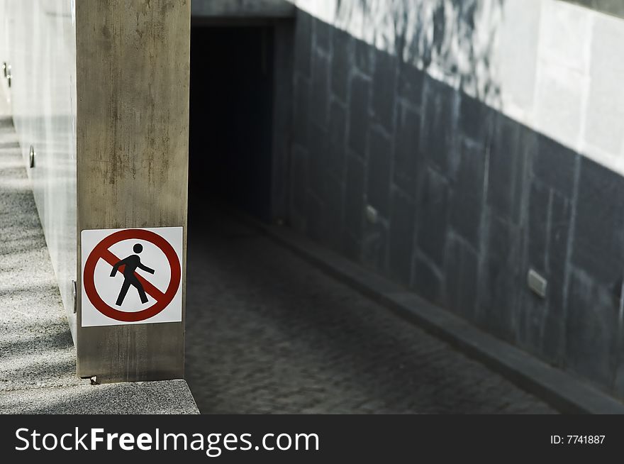 Forbidden to pedestrians, sign in the entrance of an underground car parking