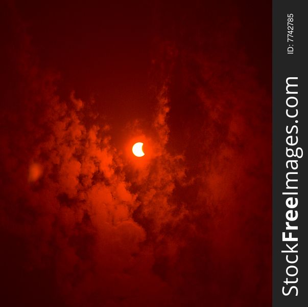 Solar eclipse view from red filter