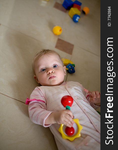 Little baby play with toys