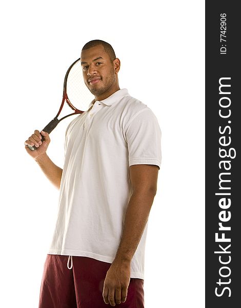 A black man in a white shirt on white background with a tennis racket. A black man in a white shirt on white background with a tennis racket
