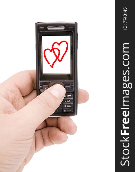 Mobile phone in man hand whith two hearts on display